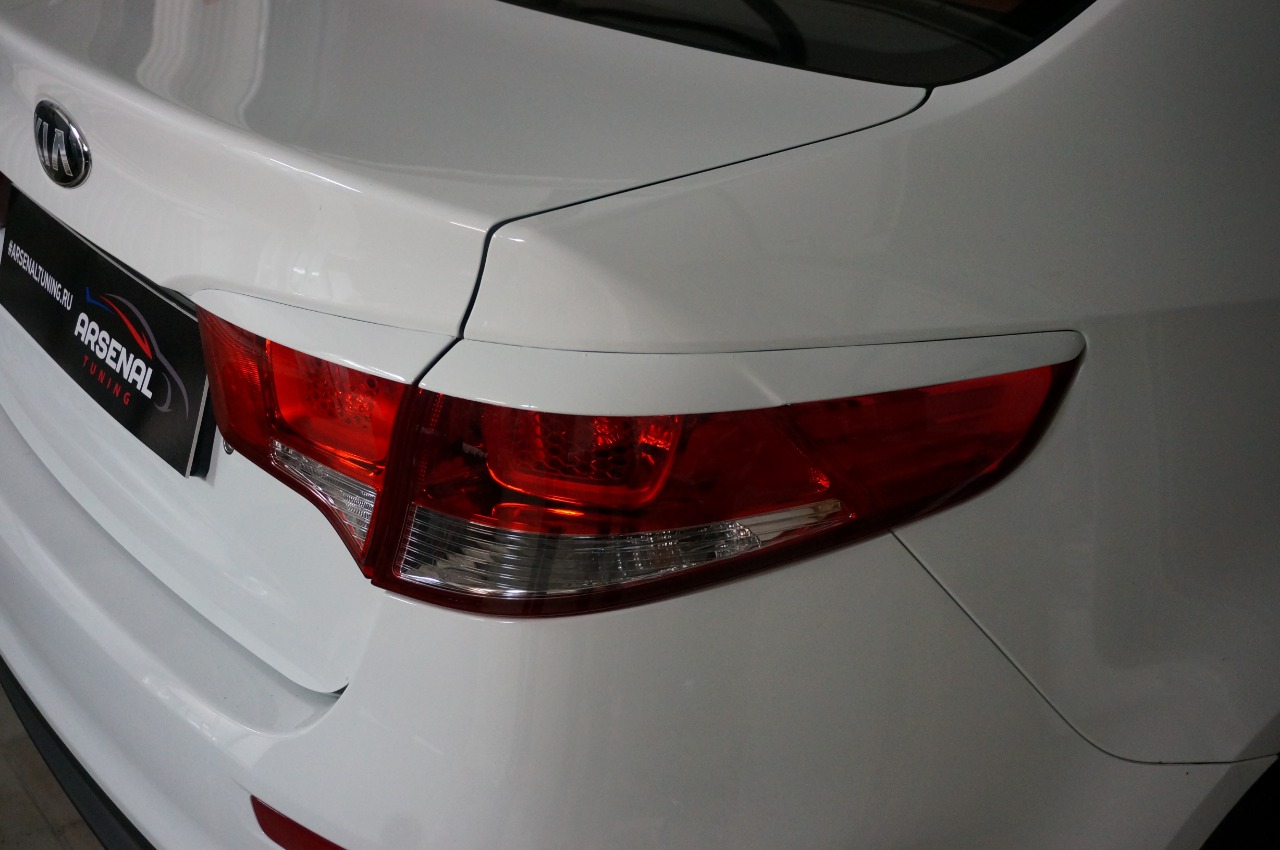 

Накладки (Реснички) на задние фонари для автомобиля Kia Rio 3 (Киа Рио 3) (2015-2017) рестайлинг широкие/узкие