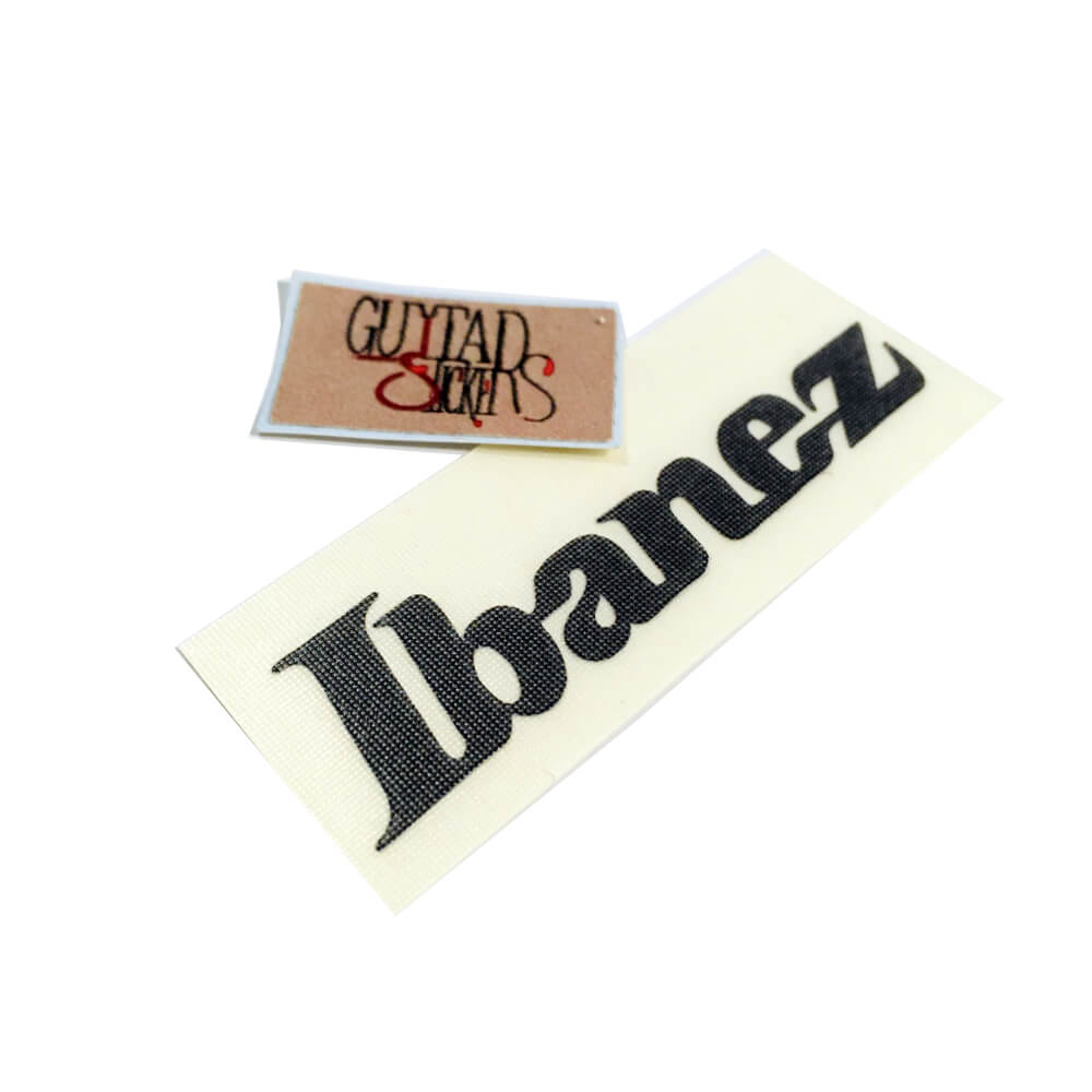 

Виниловая наклейка-логотип на головку грифа "Ibanez"